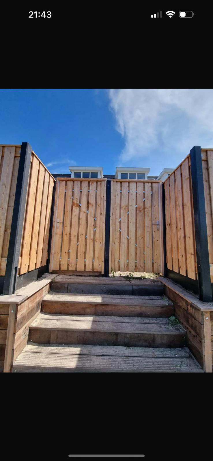 Hout schutting met trap